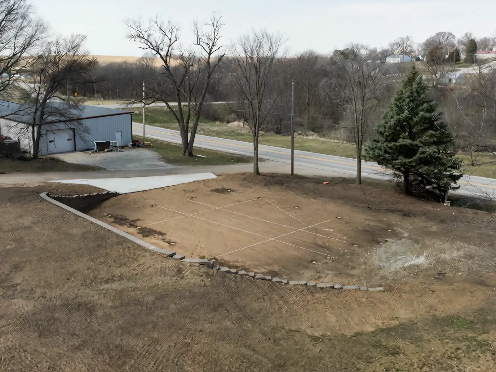 Before: bare graded building pad