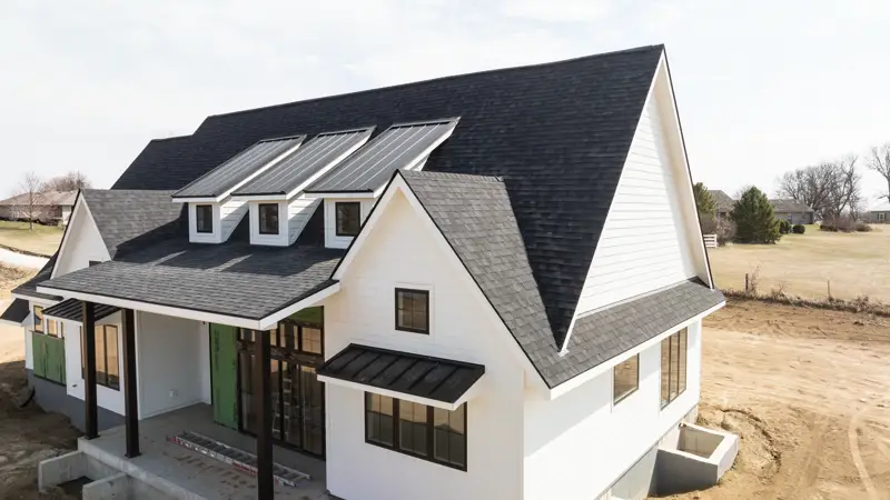 Drone view of clean white soffit and fascia on a new build